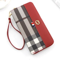 the new lady phone bag long zipper bag fashionable stripe female hand bag large wallet