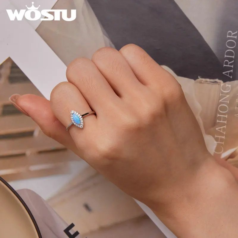 Кольцо женское серебряное в форме лошади и глаза с голубым опалом