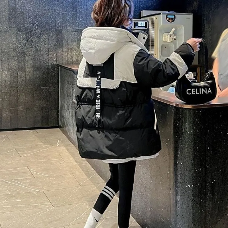 Рисунок 5 - Теплая зимняя женская пуховая куртка с капюшоном