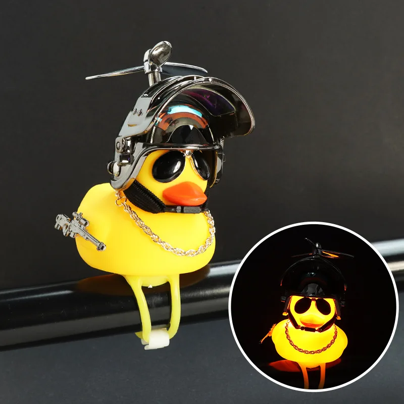 

New Yellow Duck In The Car Interior Decoration with Helmet and Gun for Bike Motor with Lights Duck Motorcycle Car Accessories