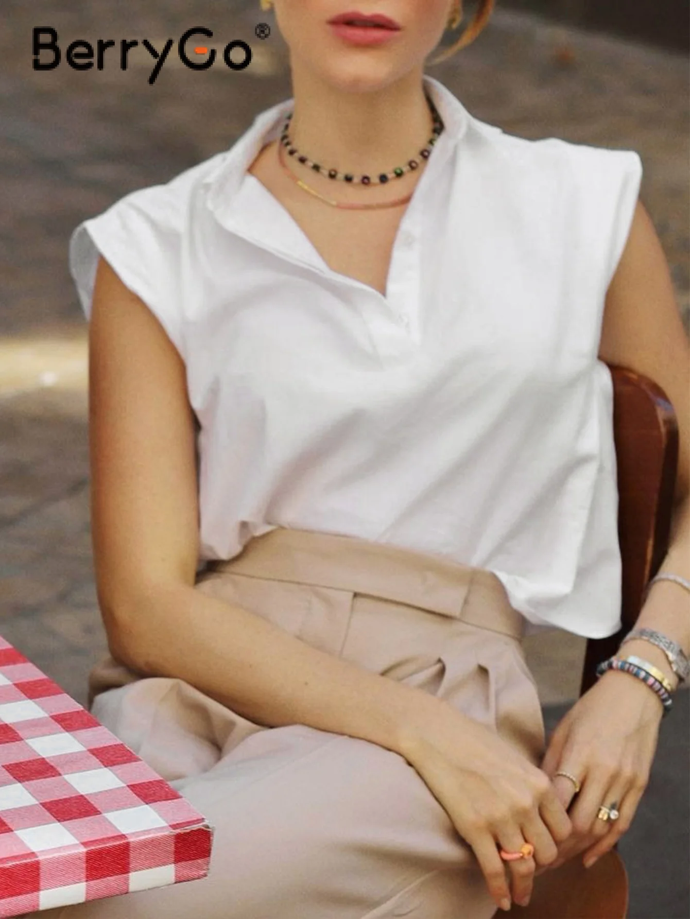 

BerryGo Fashion sleeveless shoulder pad polo collar T-shirt women High street button loose work tops Summer T-shirt office lady