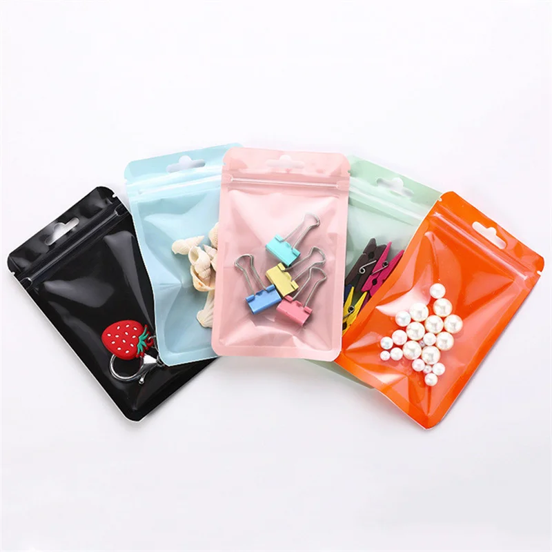 

100PCS Blue Pink Color Aluminum Foil Self Sealing Packaging Bag Jewelry Tea Sealed Pouches Window Zip Lock Gift Bags Hang Hole