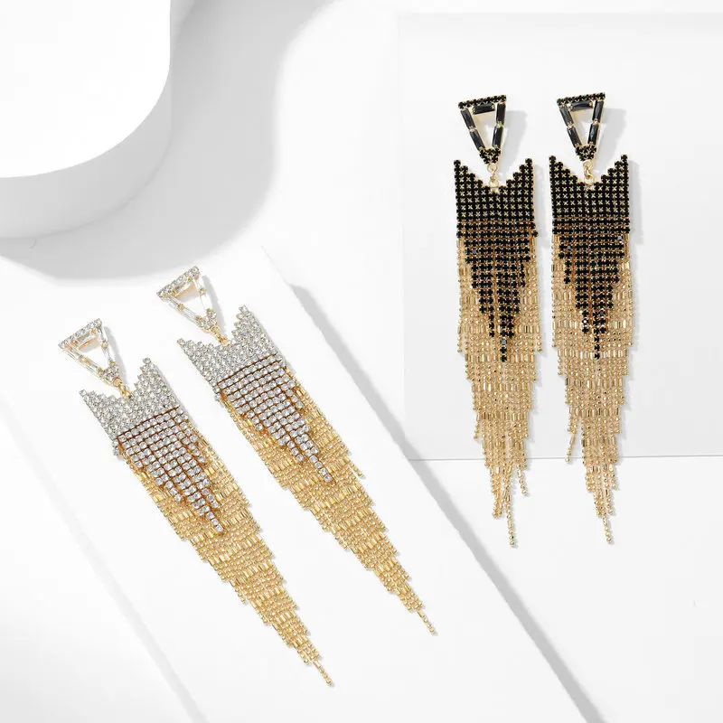 Блестящие светильник ые и роскошные серьги с кисточками украсят лицо в подарок