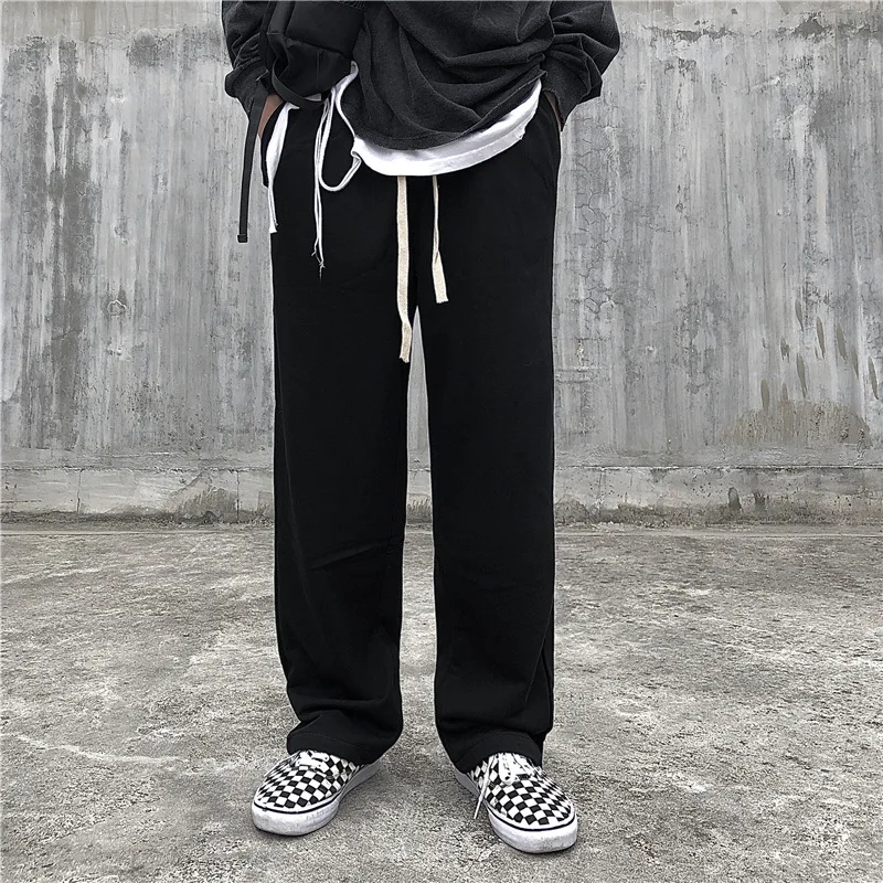 

Брюки мужские свободного покроя, модные прямые штаны со средней талией, на шнуровке, уличная одежда, винтажные широкие брюки с карманами, ве...