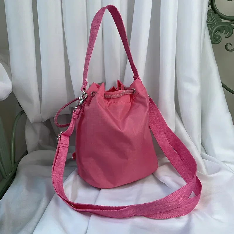 Lesportsacs Girl Сумка-бочка на шнурке 3464 Сумка через плечо одно 23*17*12 см Модная сумка для