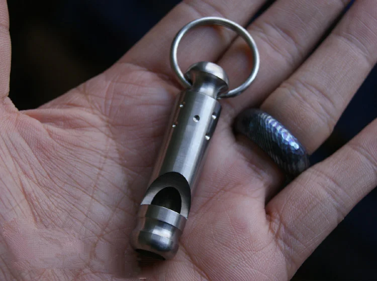 

Outdoor Titanium Alloy Survival Whistle High Decibel Blast Metal Whistle Camp Training Competition Whistle