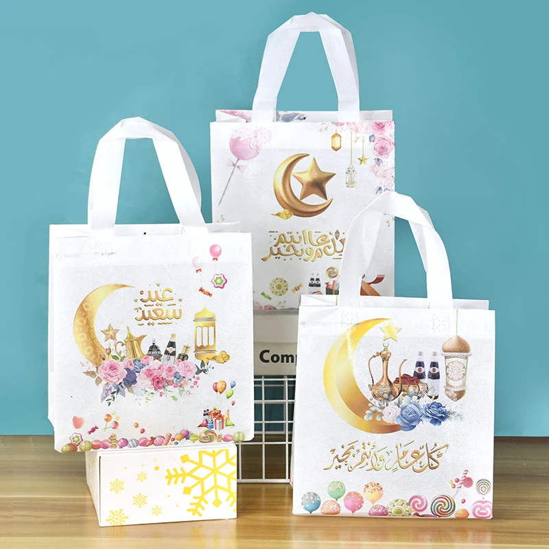 

4pcs Eid Mubarak Nonwoven Fabric Gift Bag Ramadan Kareem Cookie Candy Packaging Bag Muslim Islamic Festival Party Decor Supplies
