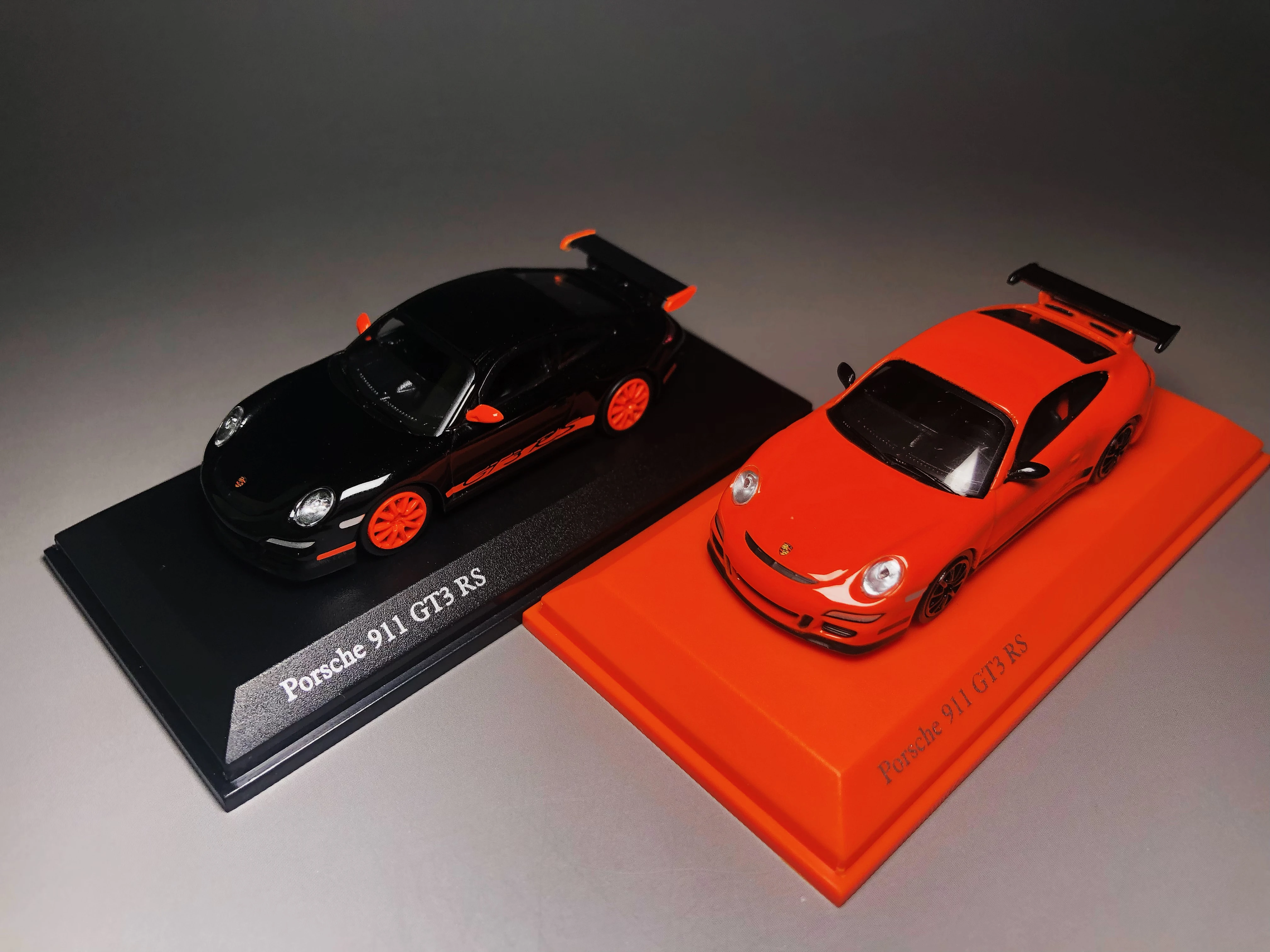 

Minichamps Tarmac Works 1/64 Porsche 911 GT3 RS 2006 оранжевая коллекция литых моделей автомобилей ограниченный выпуск хобби игрушка