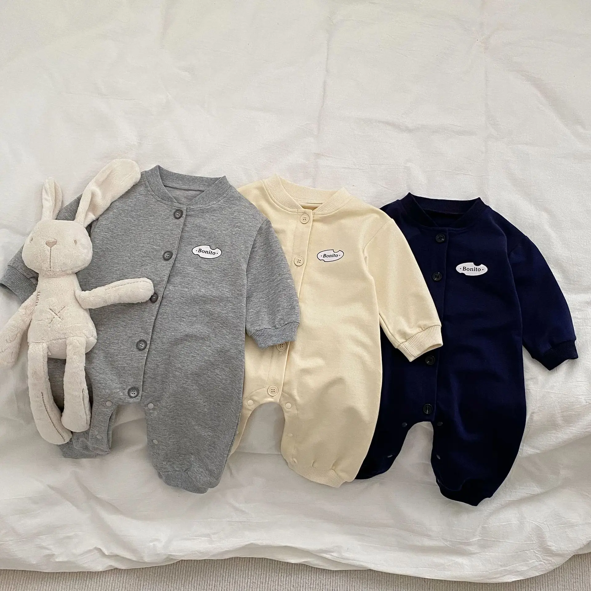 

Korean The Spring Baby Onesies Solid Color Letter Print Long Sleeve Bag Fart Clothes Boy And Girl Baby Long Crawling Clothes