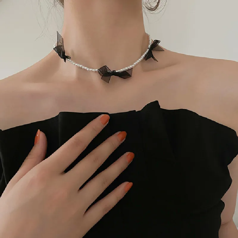 

2022 New Fashion Korean Pearl Black Bow Choker Female Summer Design Temperament Collarbone Chain Necklace Jewelry Gift