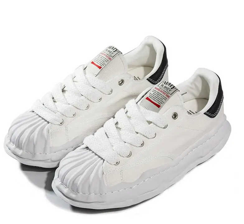 

Белые низкие кроссовки со шнуровкой для мужчин и женщин