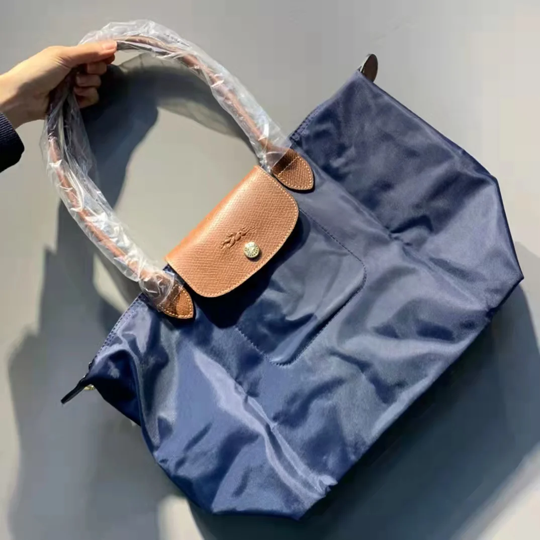 

Longchamp Authentic classic Womens New Color Le Pliage Nylon genuine Leather Tote Handbag Bag Size Large / small bags for women