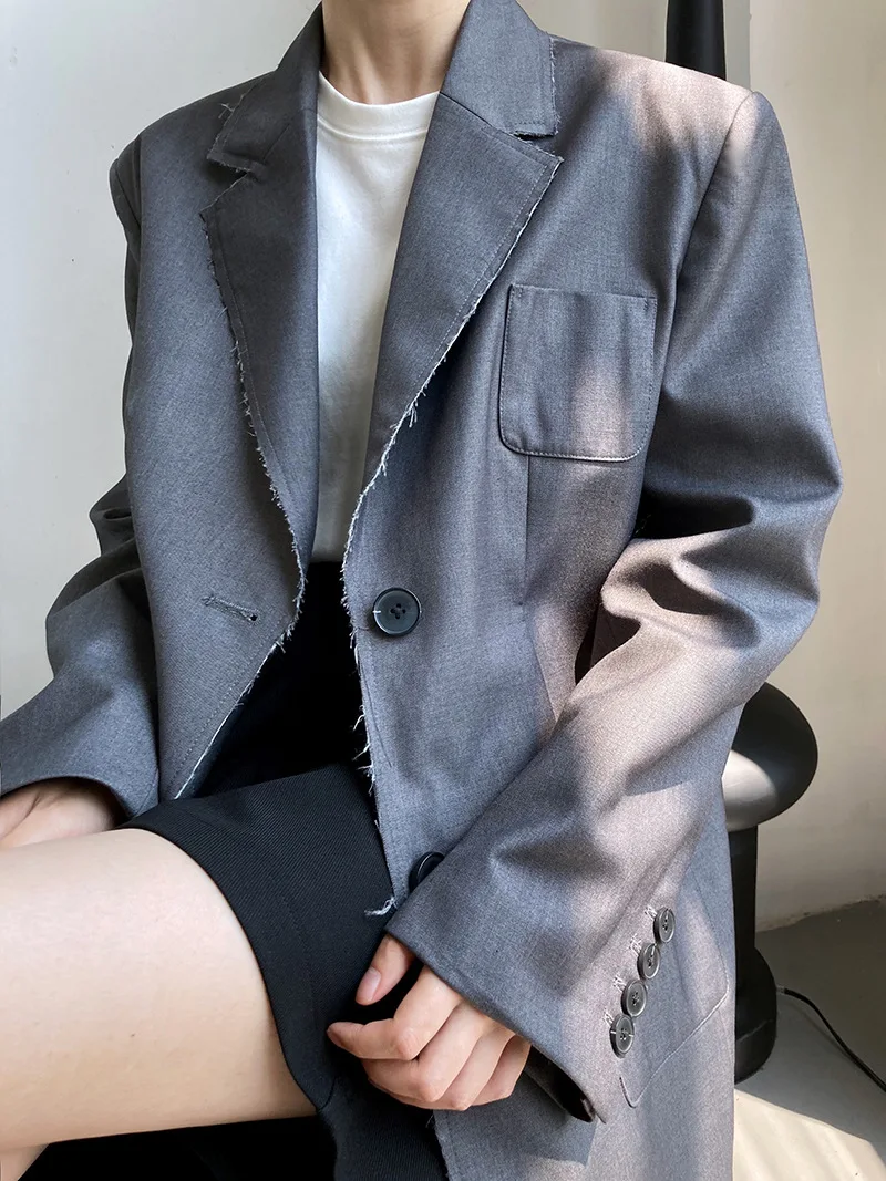 

design sense raw edge suit jacket women's early autumn new temperament simple loose commuter suit jacket