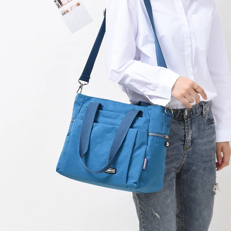 

Drop Ship Women Shoulder Bag Female Travel Handbag Large Capacity Ladies Messenger Bag Nylon Light CrossBody Bag Shopping Bag