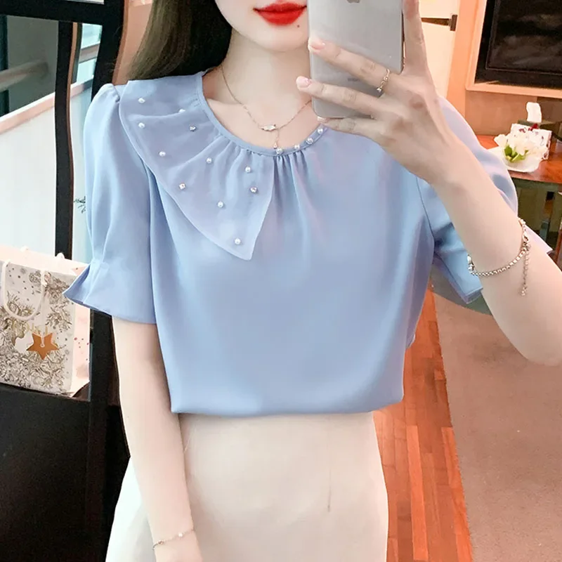 Женская шифоновая блузка с коротким рукавом круглым вырезом и вышивкой