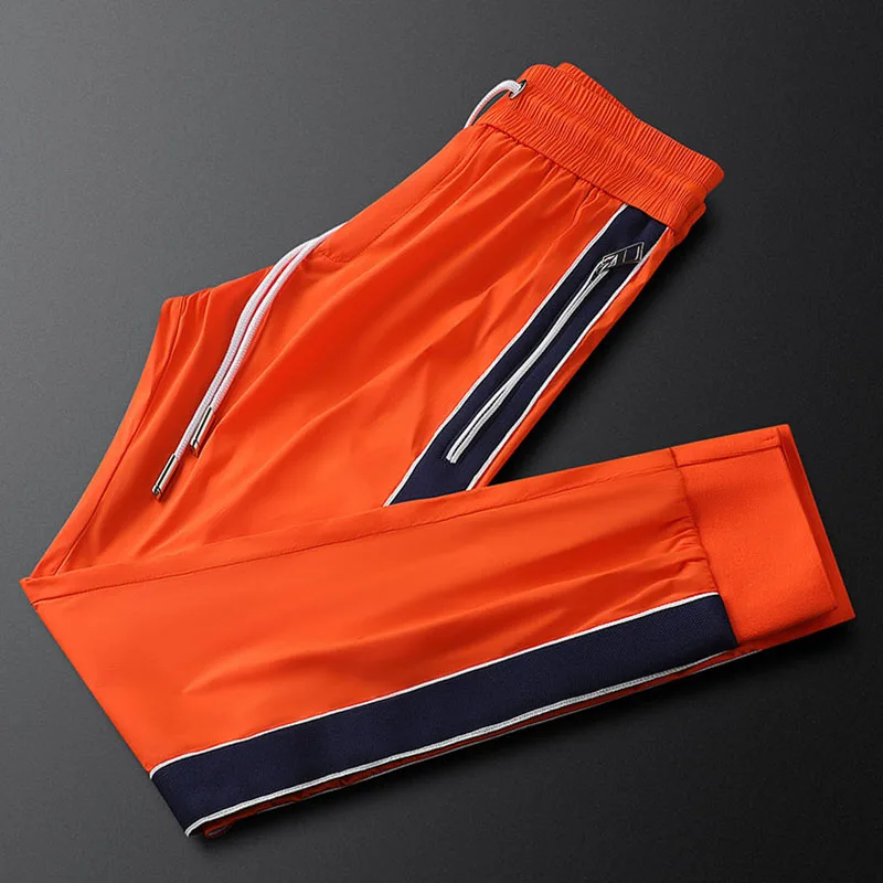 Summer men's ice silk casual sweatpants men's embroidery quick dry side stripe trend men's bunched footpants