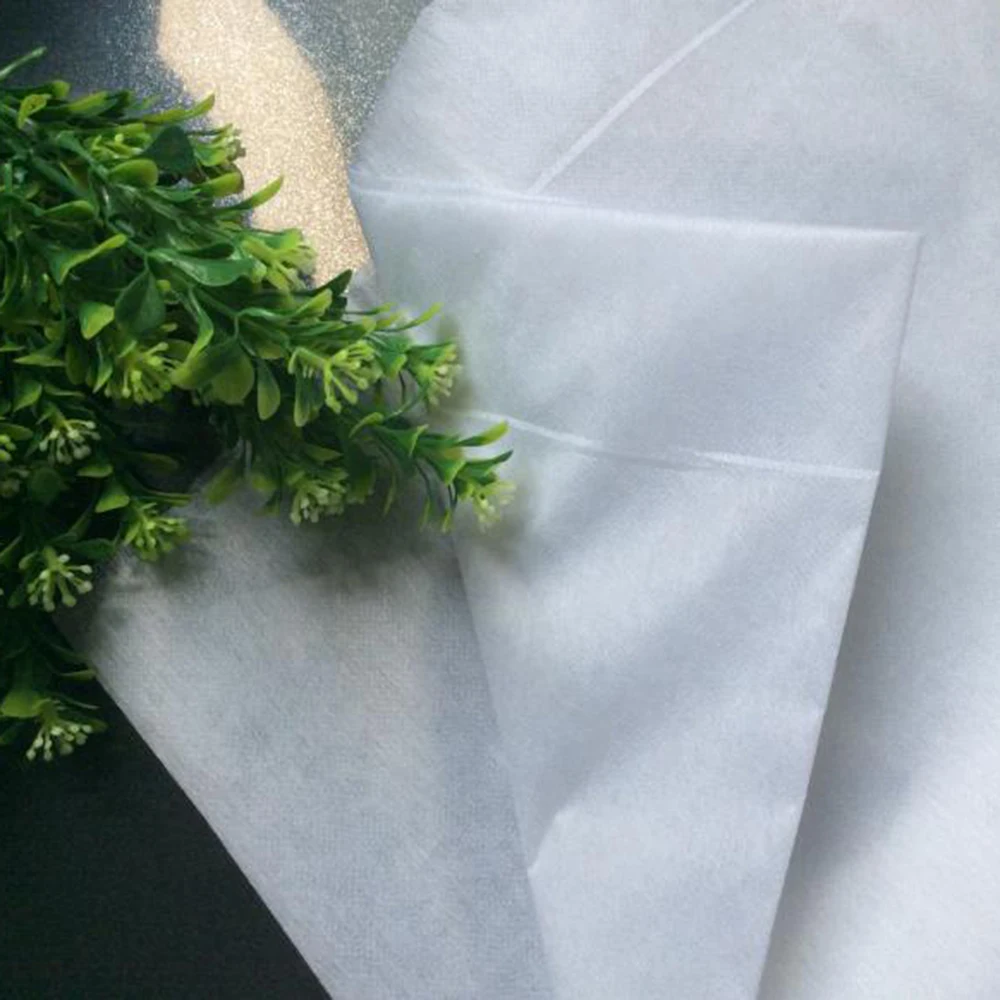 Белое плавкое прокладочное полотно клейкое Приклеивание и прокладка легко