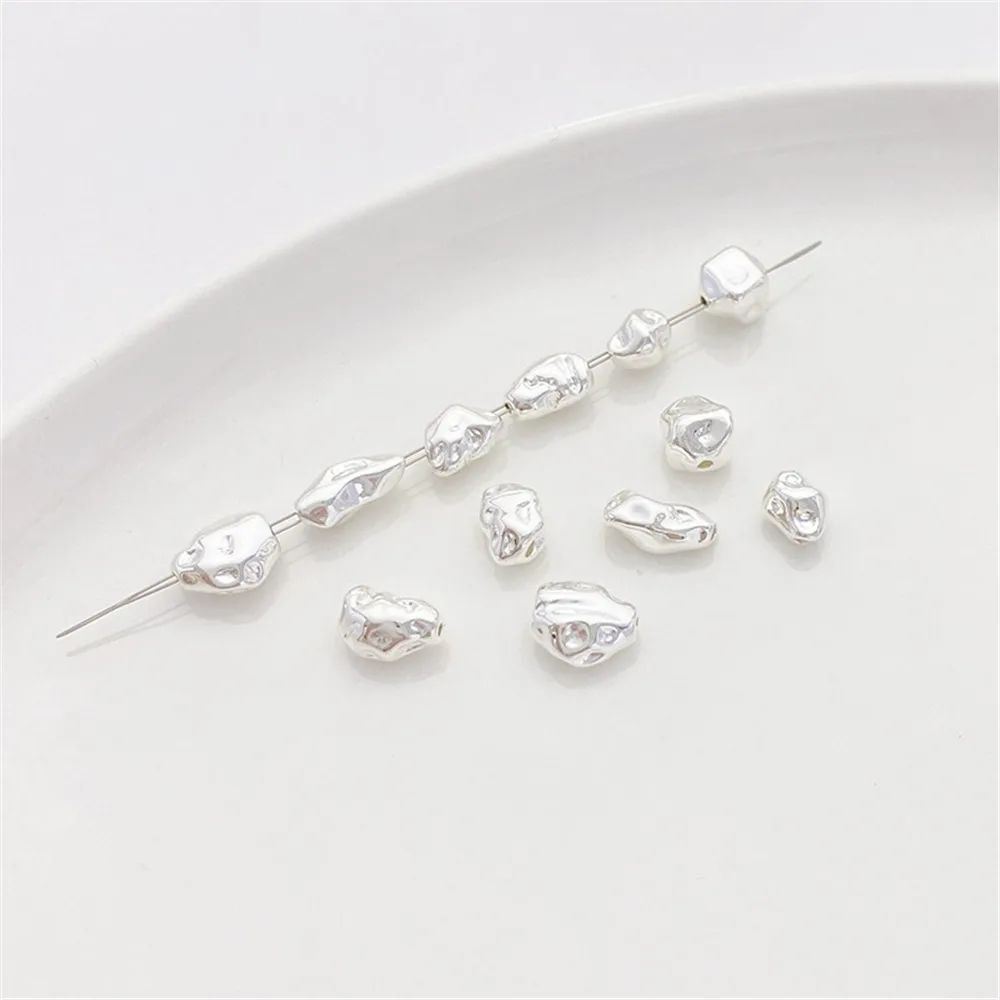 Толстые посеребренные бусины неправильной формы рассыпчатые ручной работы