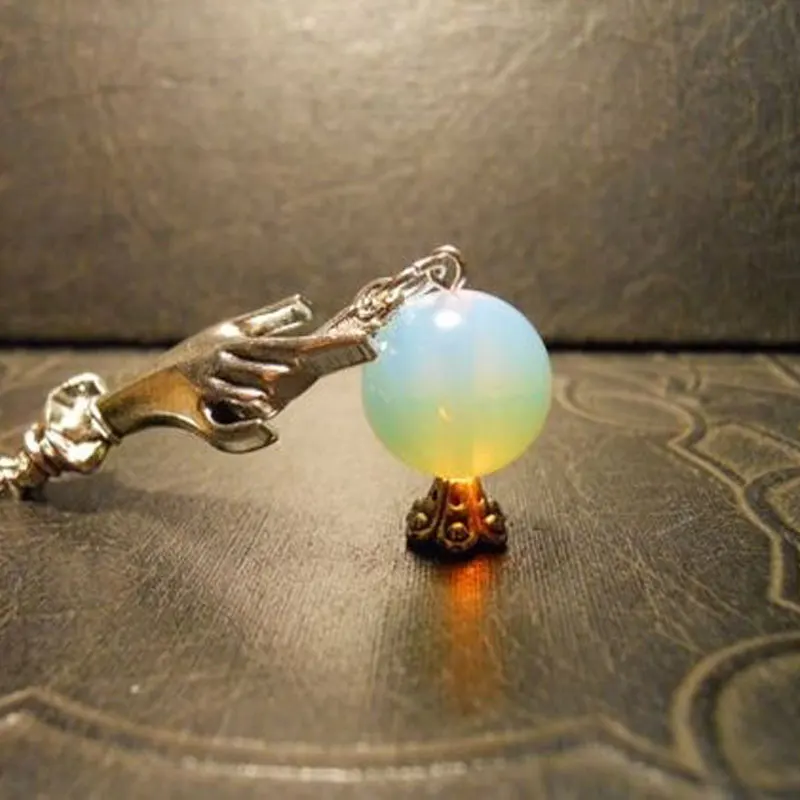 

Crystal Ball In Hand Necklace,Wicca,Witch,Pagan,Witches Ball,Gypsy, Steampunk