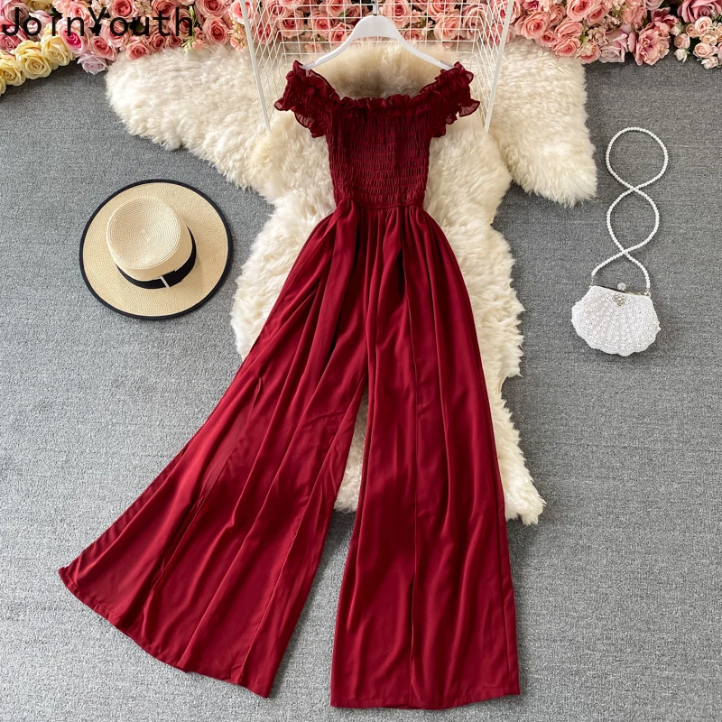 Женский комбинезон с вырезом-лодочкой широкие брюки со складками летний в