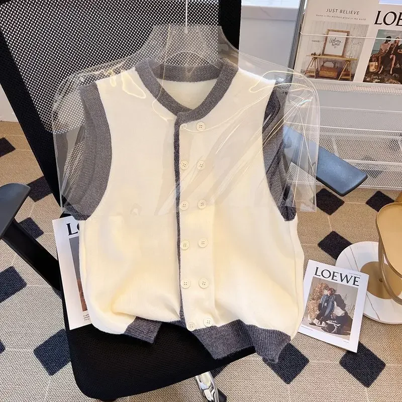 Женский трикотажный жилет на пуговицах черный или розовый Трикотажный с круглым