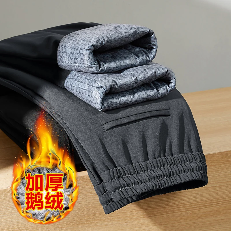 Утолщенные брюки на гусином пуху мужские внешние теплые свободные зимние