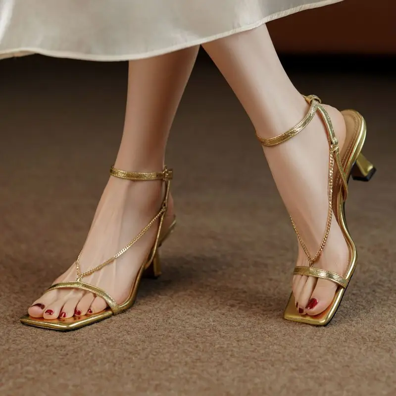 

2023 Luxury Golden Rome sandals women Sexy thin heels summer fashion Gold leather chain with square open toe high heels Shoes