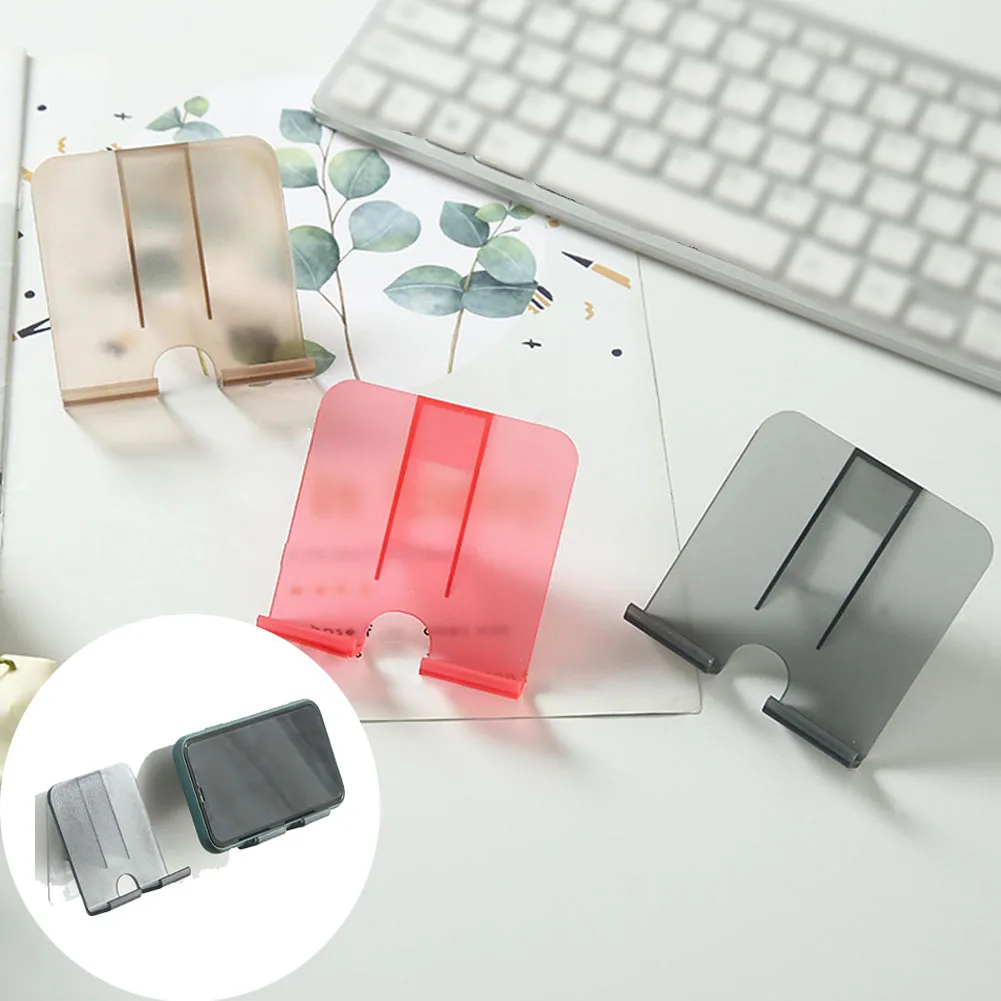 

Wall Mounted Phone Holder Multifunction Power Plug Storage Rack Mobile Phone Bracket Punch-free Plastic Sticky Hook Lazy Bracket