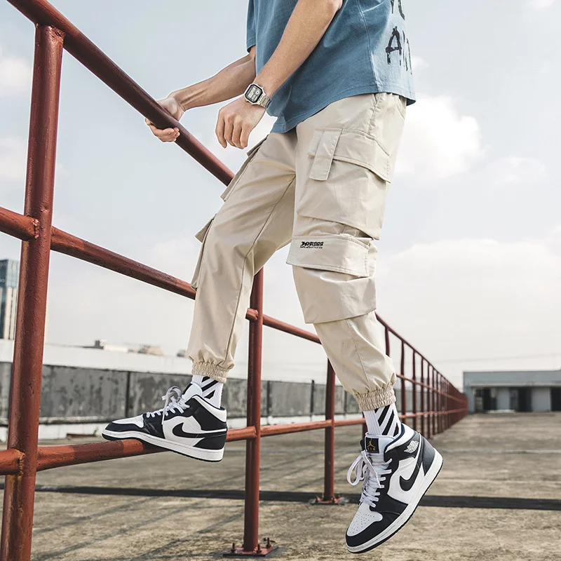 

Streetwear Mens Hip Hop Jogging Pants Casual Men Trousers Big Size Loose Sweatpants Male 2023 New Multi Pocket Harem Pants 5XL