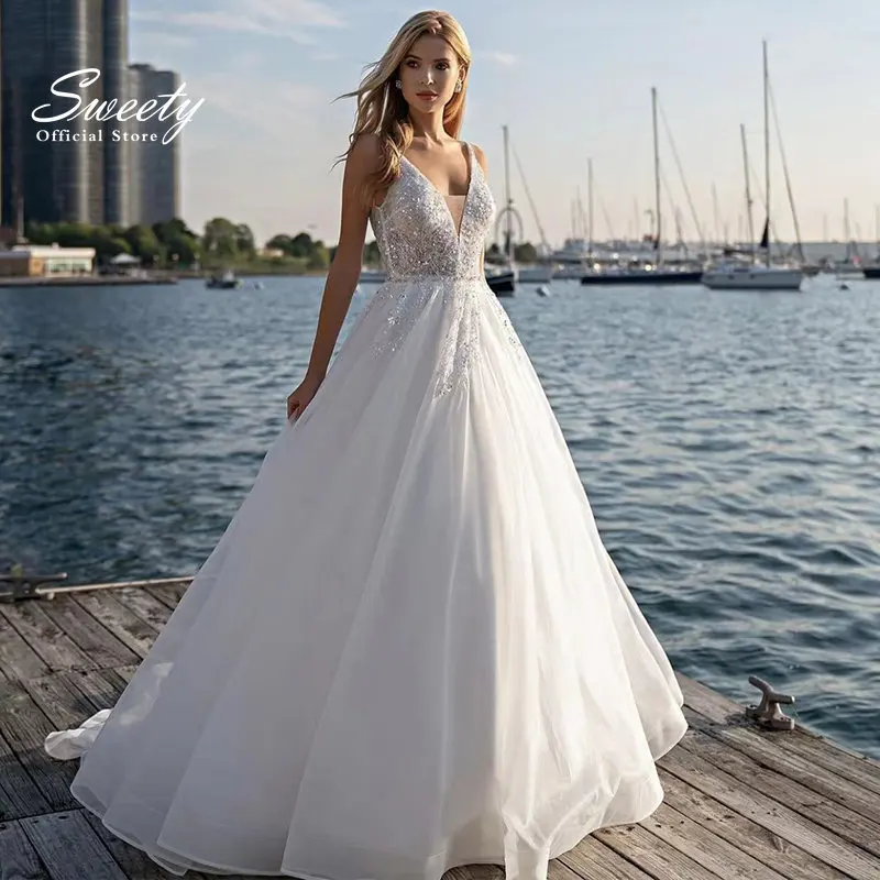 

Luxury Wedding Dress Organza With Beading A-line Floor Length Beach V-neck Sleeveless Bride Dress Backless Train Robes De Mariée