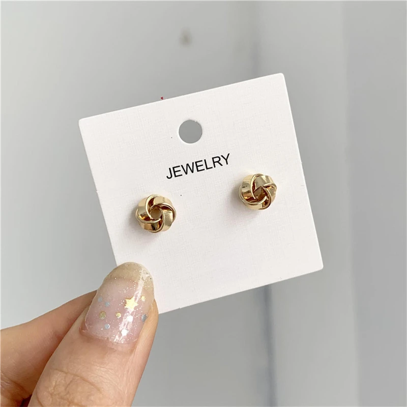 

S925 silver needle Korean temperament simple and versatile winding niche design small ear studs female personality earrings