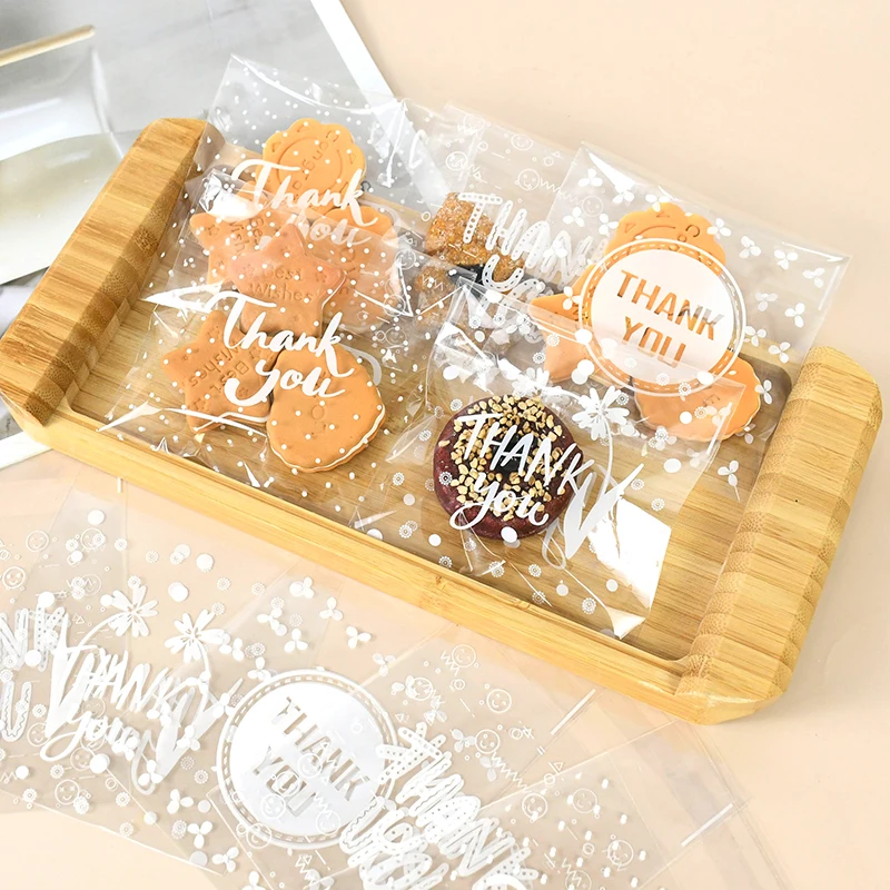 

100pcs Transparent Plastic Bag Thank You Candy Cookie Gift Self Adhesive Bag For Wedding Birthday Home Party Packaging Supplies