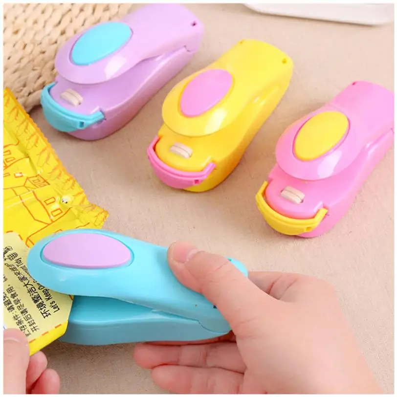 

Net celebrity fan small sealing clip heating household preservation sealer handheld sealing machine snack food bag film