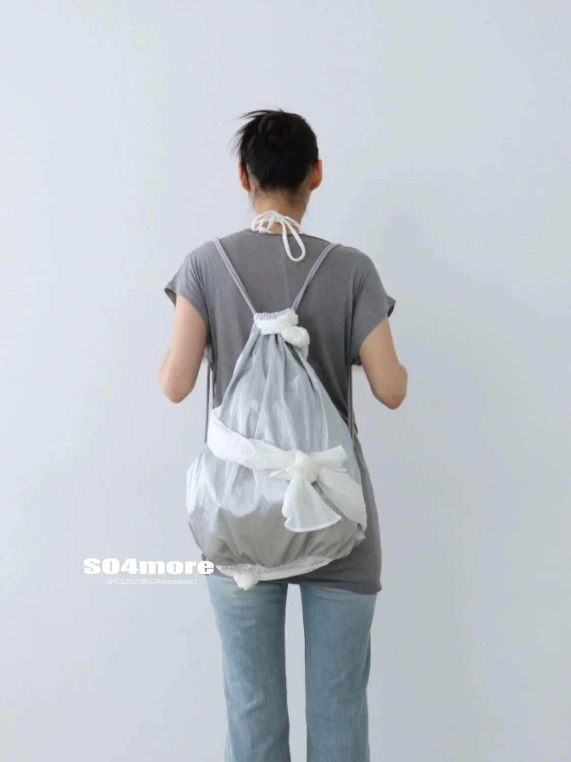 

Korean New Silver Ballet Style Women Backpack Bow Tie Niche Environmental Backpack High Capacity Drawstring Mochilas Para Mujer