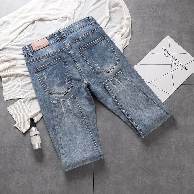 2023 Summer Thin Jeans Wool-edge Knee-knee Piercing Elastic Slimming Small Feet Pants Men's Clothing Nine-point Pants