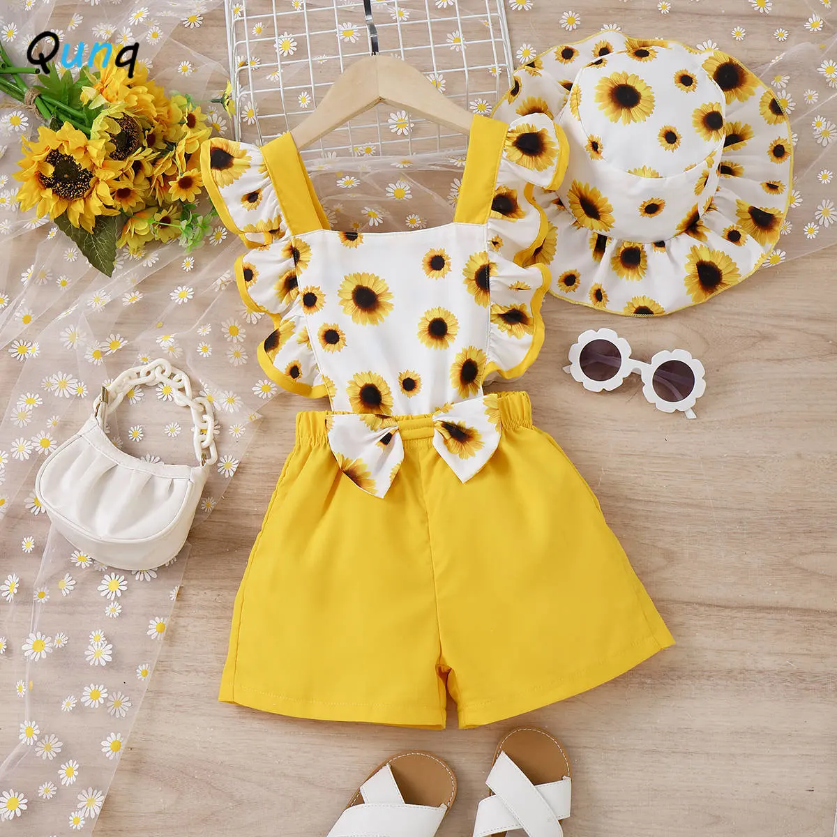 

Qunq 2023 Summer Girls Sunflower Ruffled Edge Suspenders Bow Jumpsuit Shorts + Cap 2 Pieces Set Casual Kids Clothes Age 3T-8T