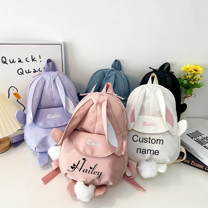 

Персонализированный Рюкзак Kawaii Bunny для девочек с милыми кроличьими ушками и пушистой подвеской в виде медведя, школьный рюкзак для детей