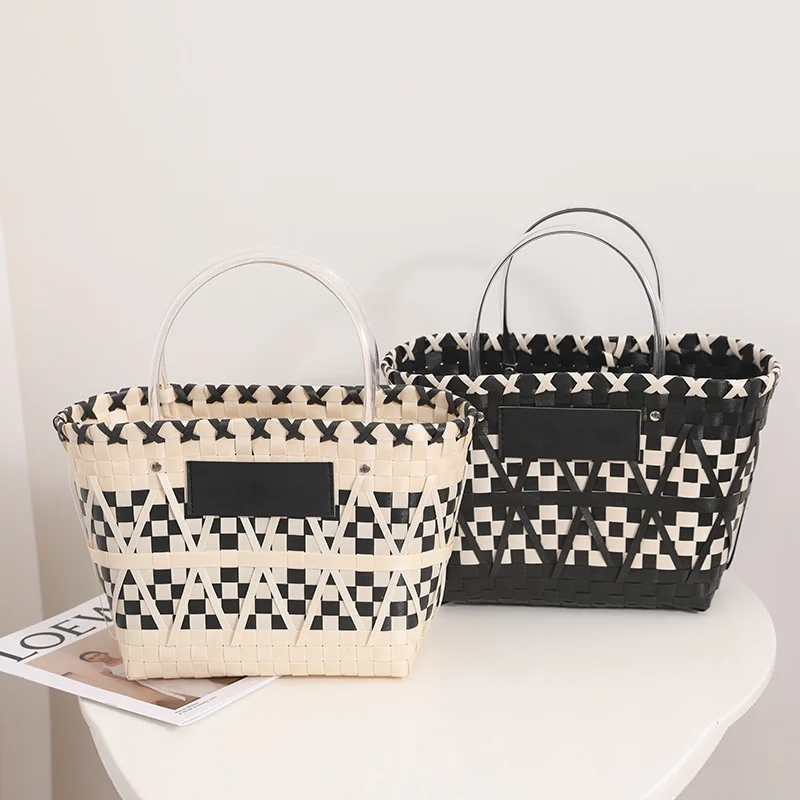 

Black white plaid texture hand-held woven bag new panda color portable vegetable basket bag niche portable shopping women's bag