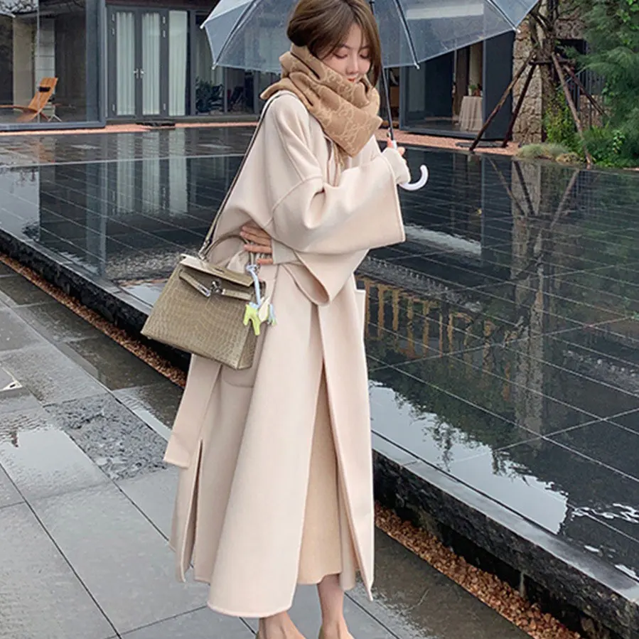 Женское длинное шерстяное пальто элегантное дизайнерское с открытым стежком