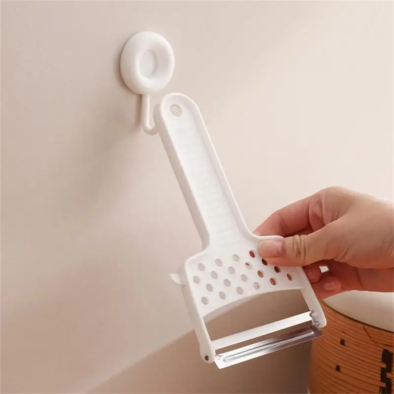 

Multi-function peeler kitchen potato apple digging hole peeler three-in-one stainless steel large vegetable peeler
