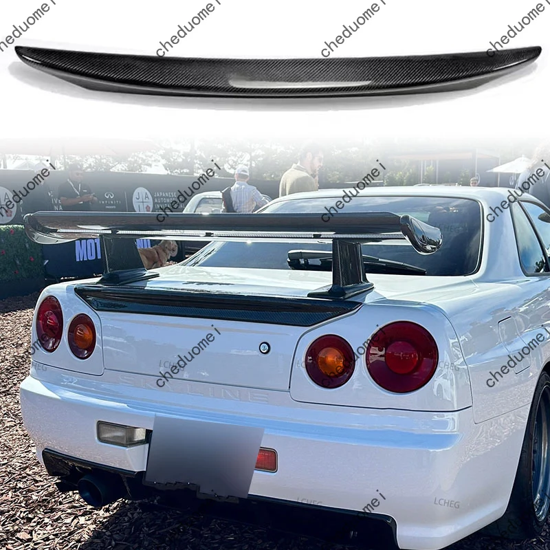 Фото Подходит для Nissan Skyline GTR R34 GTT 1999-2002 годов выпуска. Задний спойлер на крышку багажника из карбона. Аэродинамический элемент для стайлинга автомобиля. №1