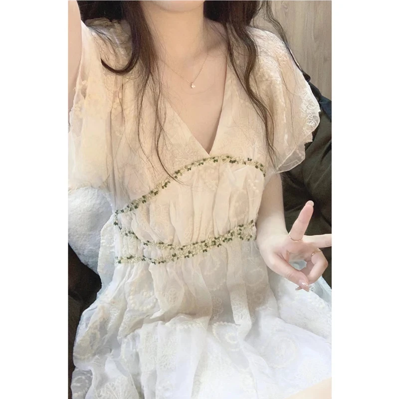 

Fairy embroidered V-neck dress women's summer 2022 new court style design sense medium length temperament dress