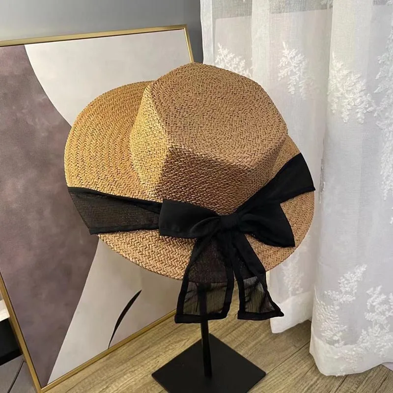 

French romantic bow hexagonal rhombic straw hat leisure sunscreen hat.