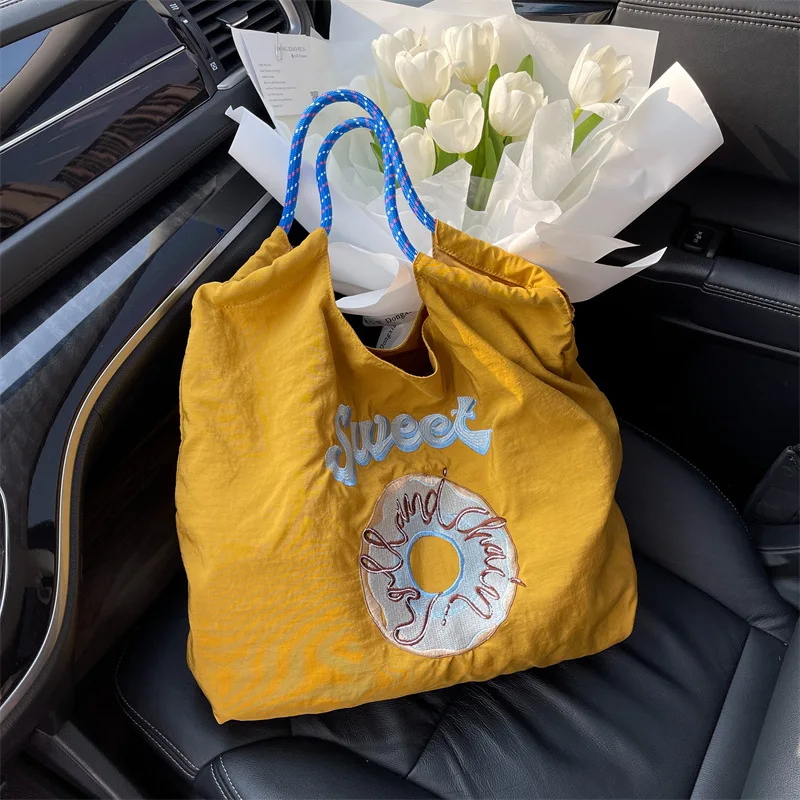 

2022 New Large Capacity Embroidered Nylon Cloth Shopping Bag Drawstring Cloth Bag Tote Bag Cc Gg Women's Handheld Shoulder Bags