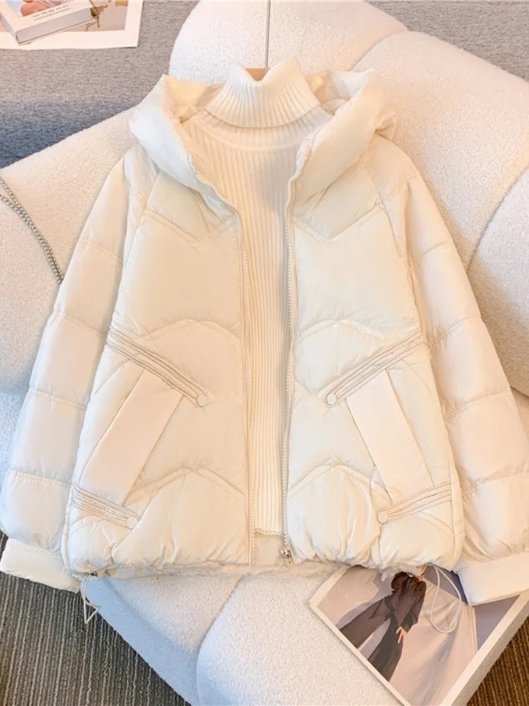 Зимняя популярная теплая женская одежда больших размеров. Пуховик с капюшоном.