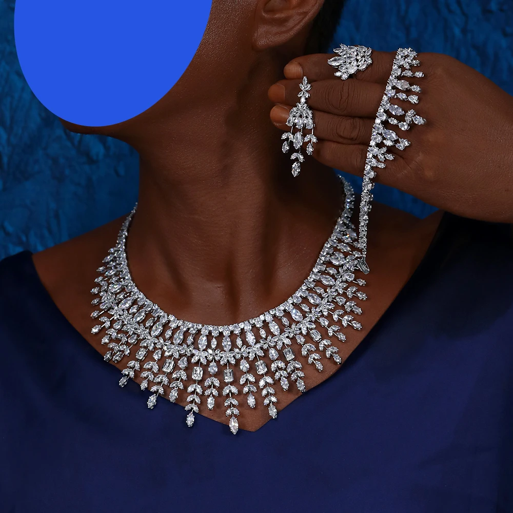 

Роскошные серебряные и золотые ожерелья с кубическим цирконием капли воды Женский комплект Дубай Свадебные ювелирные изделия 4 шт. свадебные аксессуары для выпускного X0277