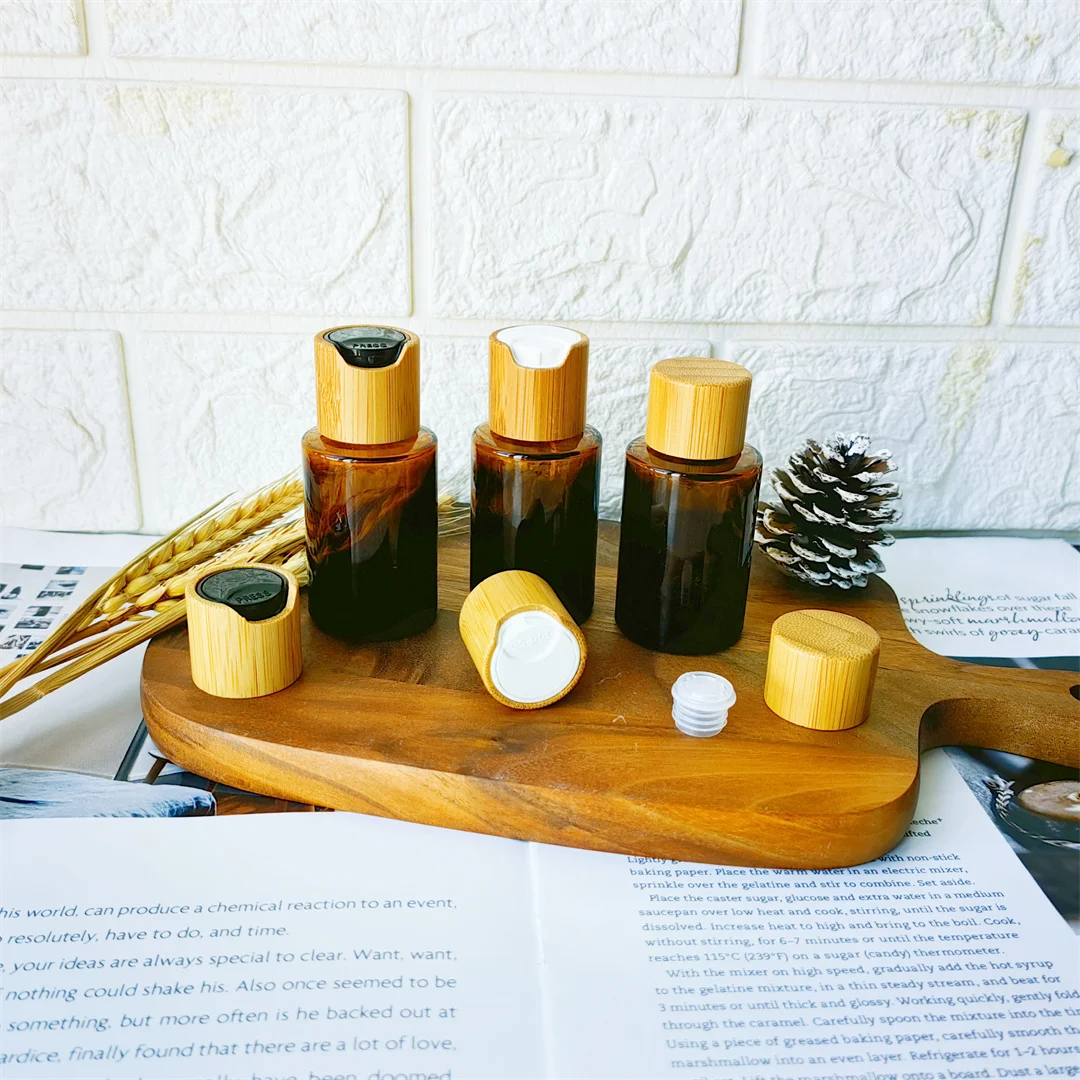 

Amber Essential Oil Bottle with Bamboo Screw Cap Skin Toner Liquid Packaging Lotion Shampoo Bottle with Bamboo Disc Top Cap