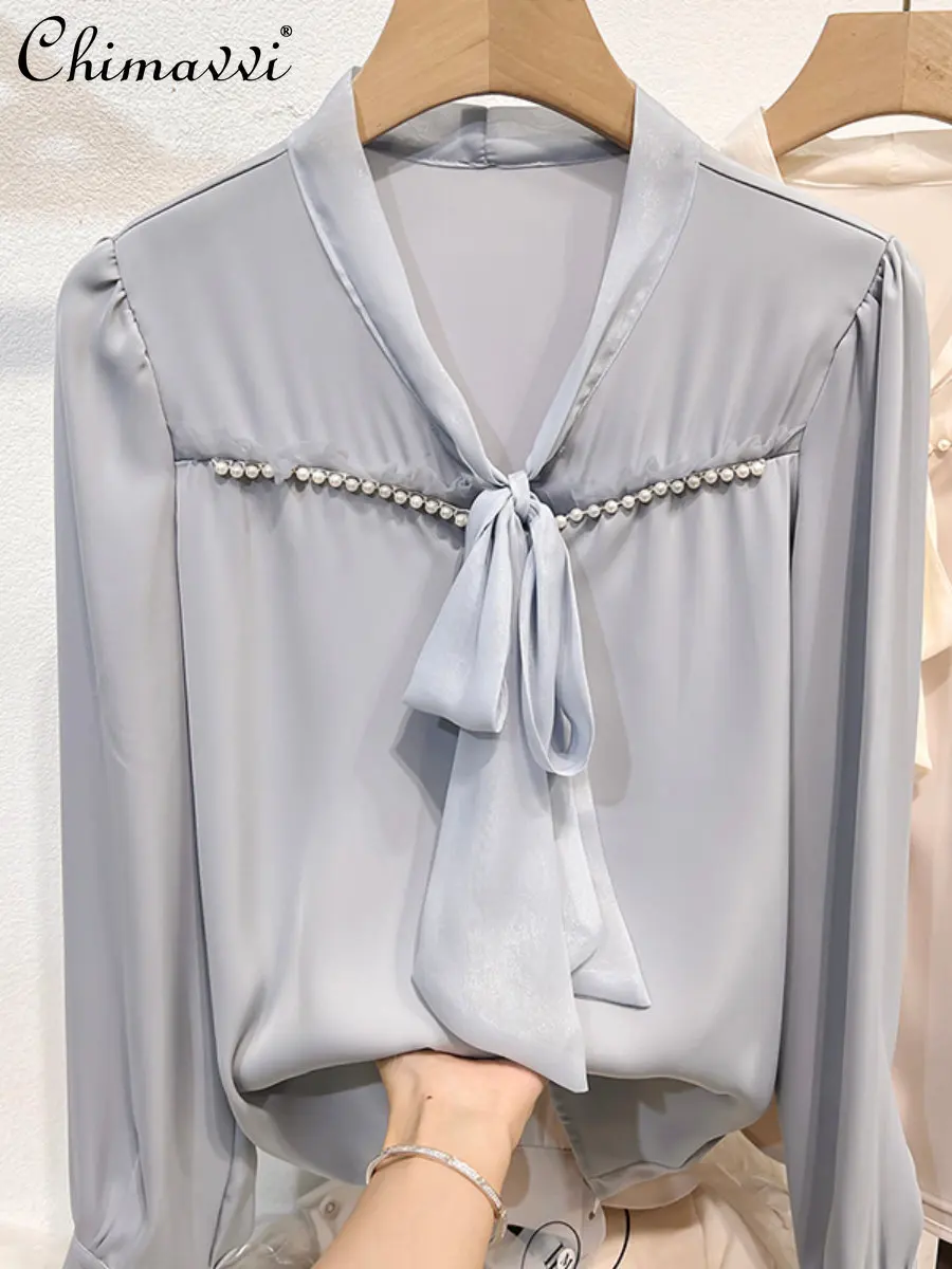 

2022 Autumn New Korean Style Slim Fit Solid Color V-neck Lace-up Beaded Pullover Shirt Loose Long Sleeve Chiffon Blouse Women