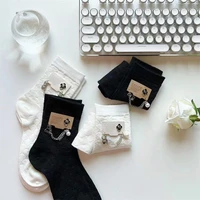 fashion chain leather label jewelry socks black white thin spring and autumn middle tube socks womens gift