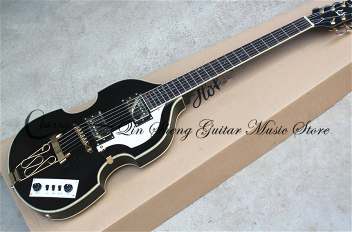 

6 strings electric guitar, hollow black guitar,tailpiece bridge HH pickups,gold buttons,maple neck,white binding